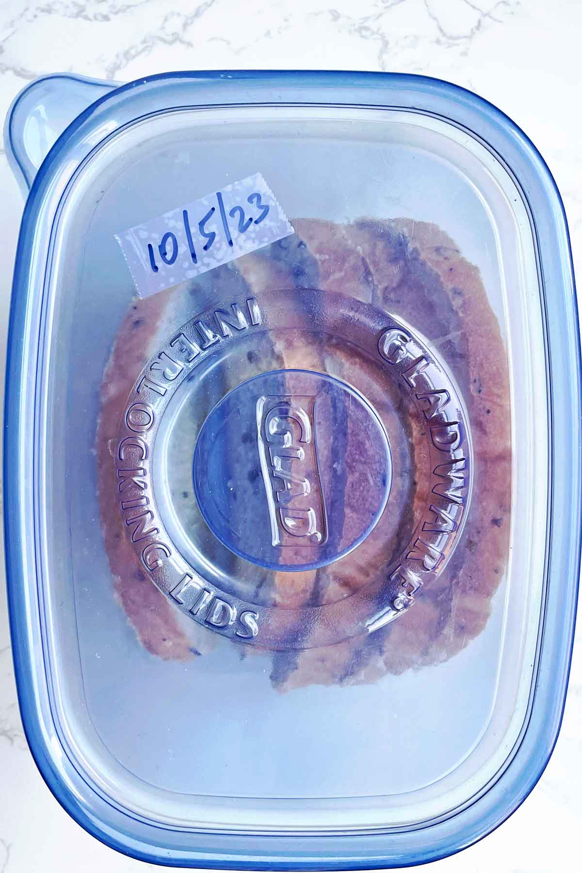 bread slices in freezer safe container.