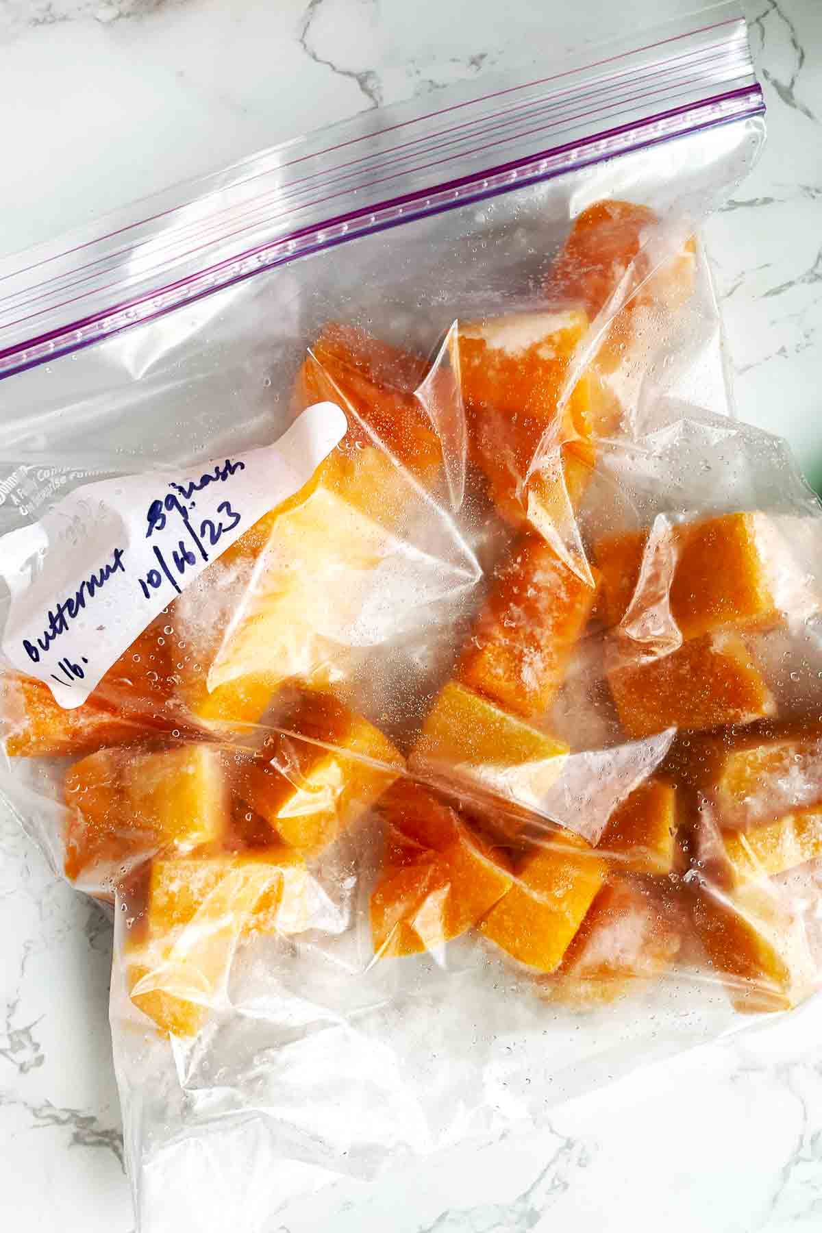 cut butternut squash in ziplock bags.