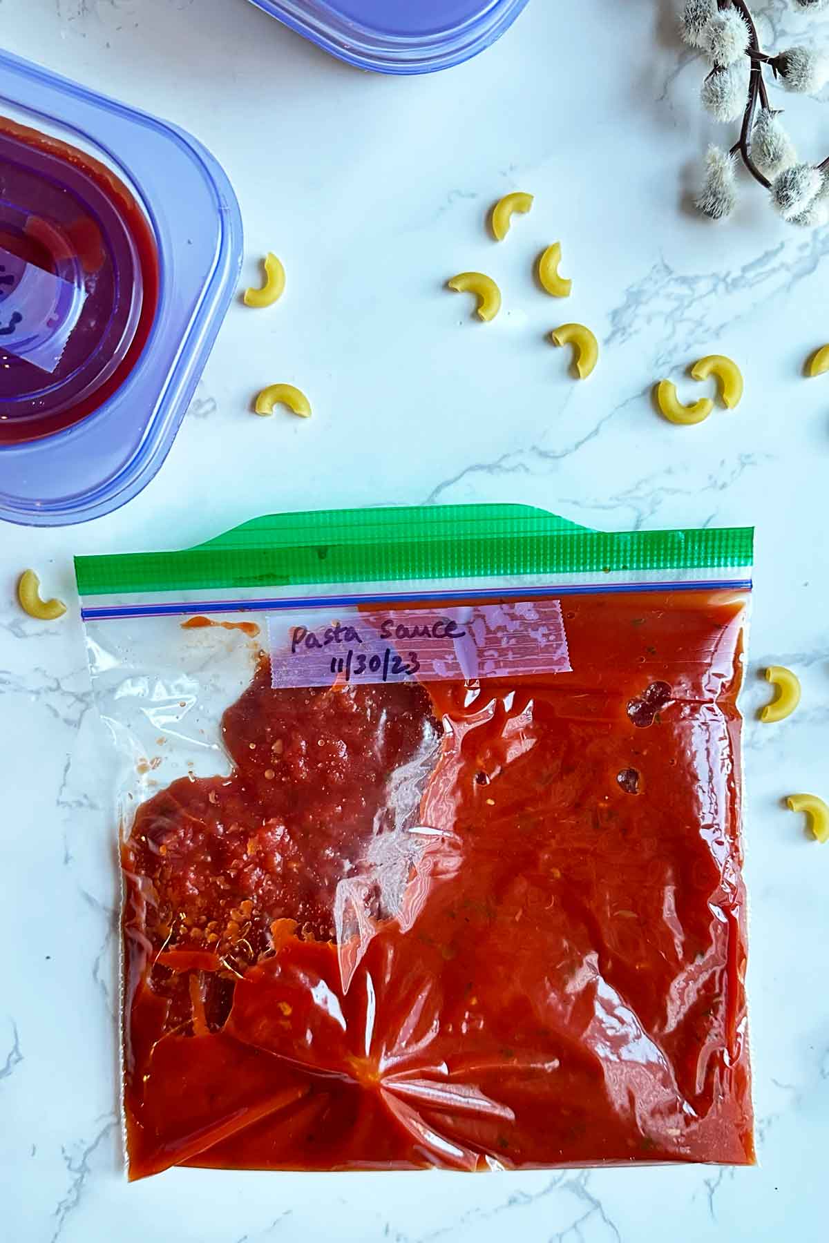 pasta sauce in ziplock bag.