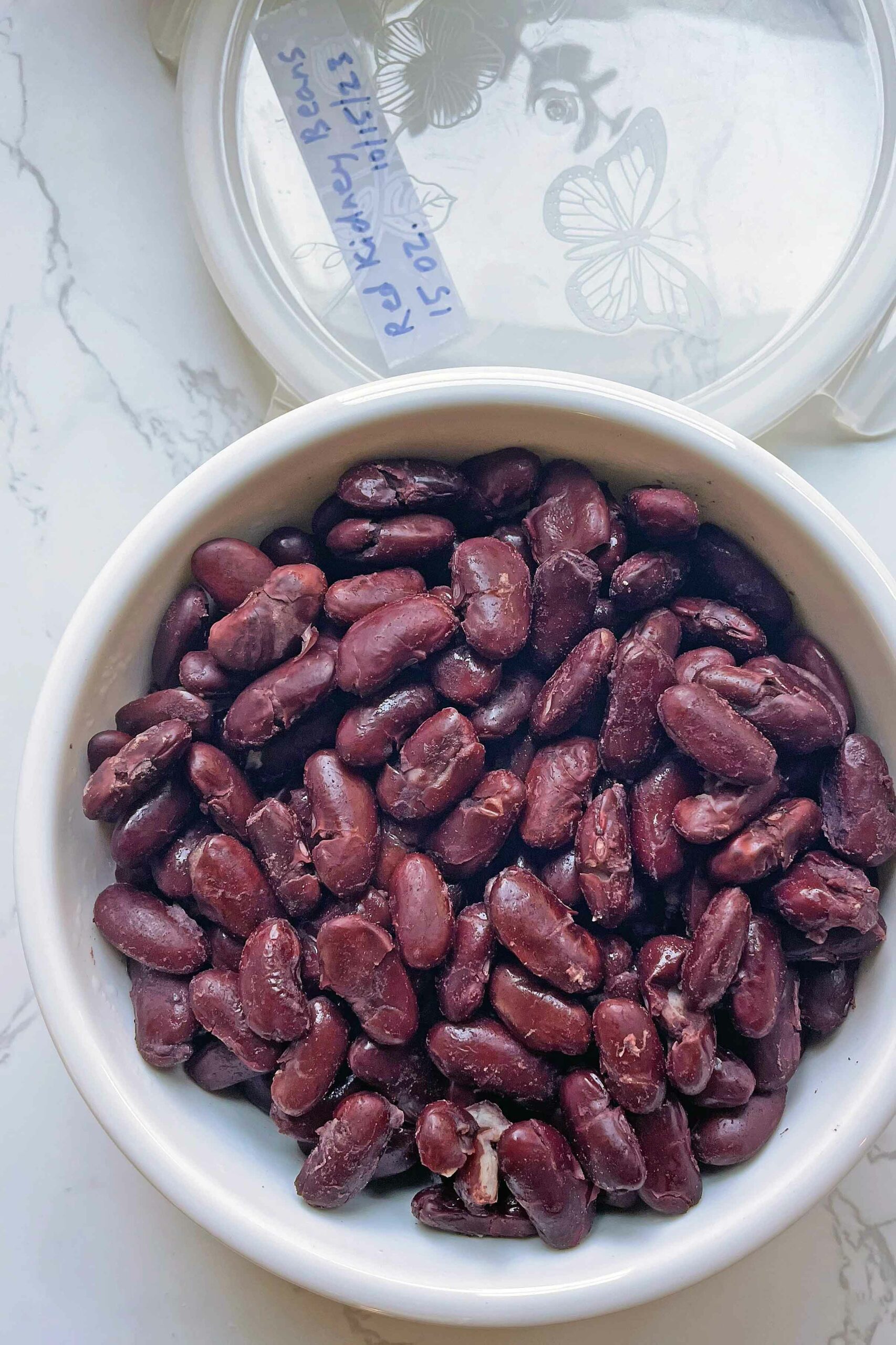 Pressure cooked rajma beans in a container.