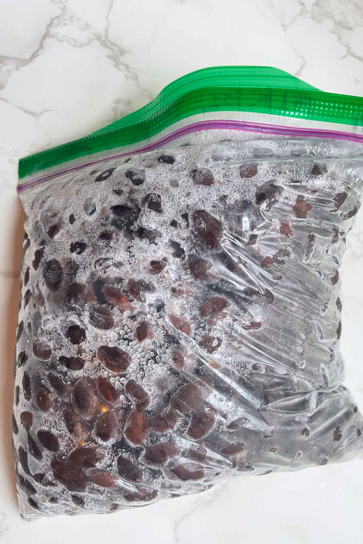 frozen black beans in ziplock bag.