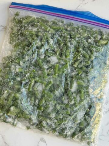 Frozen green beans in ziplock bag.